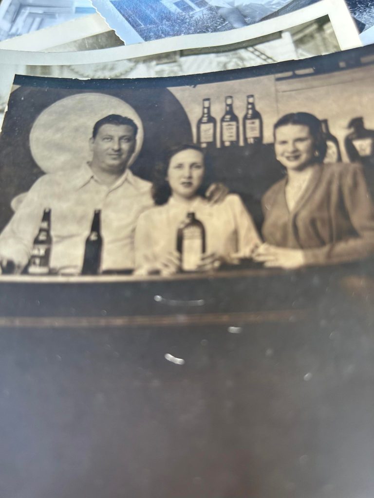 Early photo of Anthony Carollo with wife Maria and unidentified woman at a bar owned by Anthony.